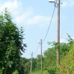 Moderne Kompakt-Leuchtstofflampen helfen am Hanauer Fuß- und Radweg entlang des Kinzig-Ufers Energie zu sparen.
